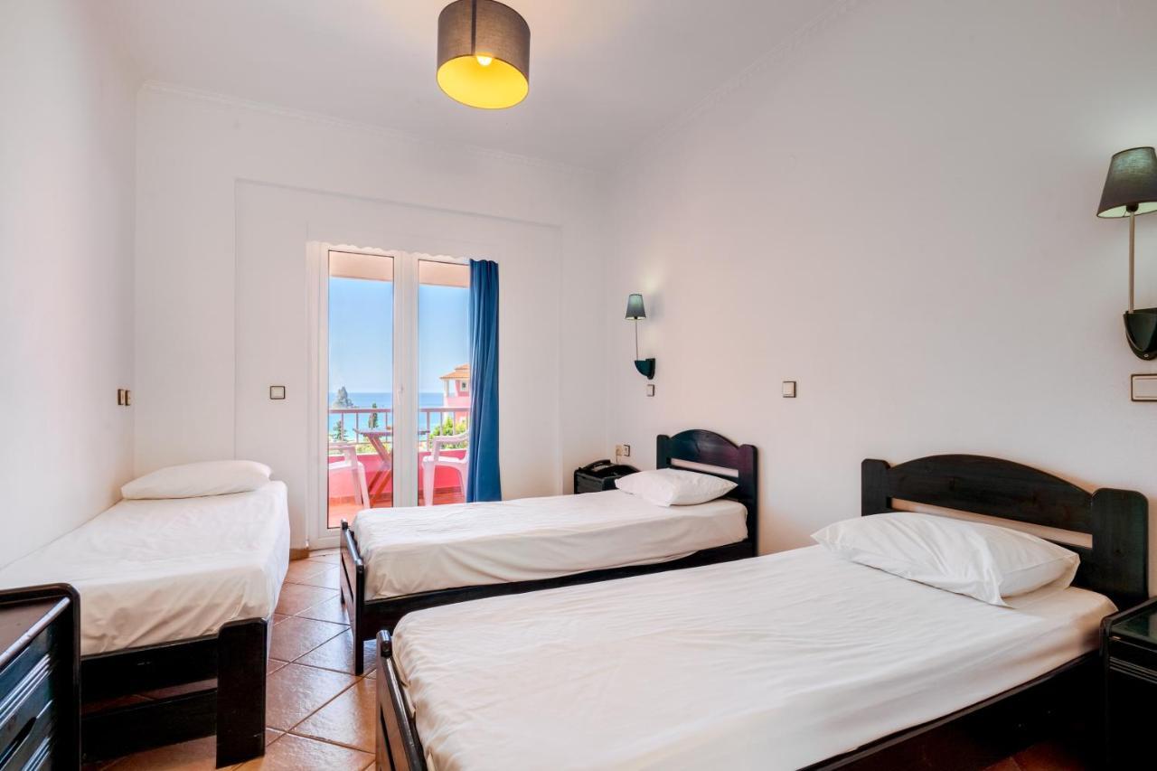 Pink Palace Beach Resort อากิออส กอร์ดิออส ภายนอก รูปภาพ